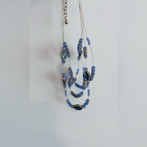 Blue and purple string necklace with beads